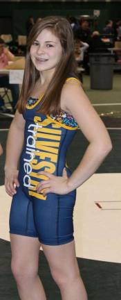 Female athlete competes in national wrestling competition Marlee Smith.