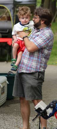 Community comes out for child battling condition Three year old Eoghan Owie , Meg and Nick Demsack.