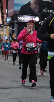 Photos provided Mary Helen Kellam of Sparta running in a recent half marathon in New York City. She will be running in the NYC Marathon to raise funds for suicide prevention.