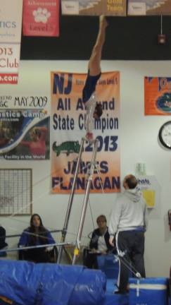 Gator Gymnastics hosts internal meet Dara DePaolo of Wantage performs on the uneven bars.