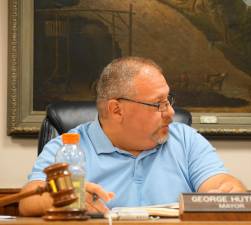 Mayor George Hutnick reviews Predmore Rd. progress