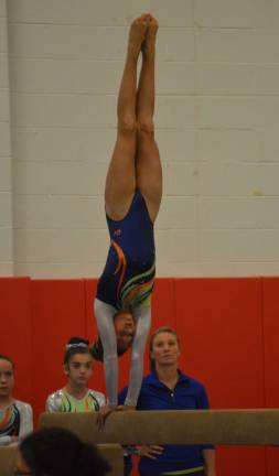 Caroline Dietz of Lafayette on the balance beam at the Acorn Cup.