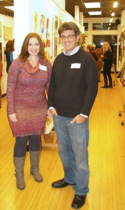 Skylands Gallery show benefits Father John's Animal House Karen Yost from Father John's Animal House, which is this monthþÄôs benefiting charity, is shown with gallery director John Maione Jr.