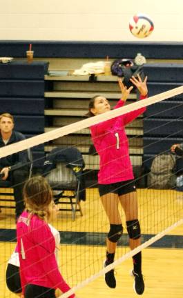 Jefferson's Gabriella Maffei (1) taps the ball towards the other side of the net. Maffei accomplished 1 ace, 7 kills, 2 blocks and 8 digs.