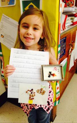 Raven Wright, from Mrs. Amanda Winters&#xfe;&#xc4;&#xf4; 2nd grade class, is proud of her final creation.