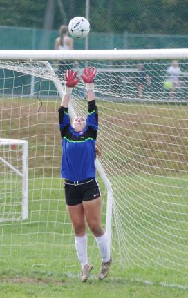 Kittatinny goalkeeper Natalia Mattar leaps to intercept the ball in the first period.