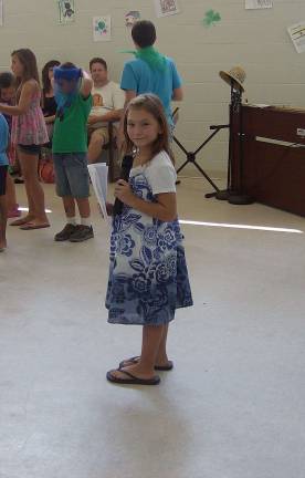 Summer KEEP accepting applications Delaney sings during last summer's end of the summer music show.