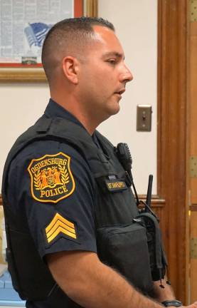 PHOTOS BY VERA OLINSKI Sergeant Joseph Sanfilippo discusses police grants with the Ogdensburg Council.