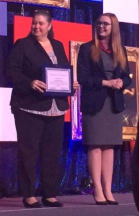 Michelle Bifano was selected the Wallkill Valley FBLA chapter&#xfe;&#xc4;&#xf4;s Volunteer of the Year and was honored at the 2017 State Conference; Northern Region Vice President looks on.