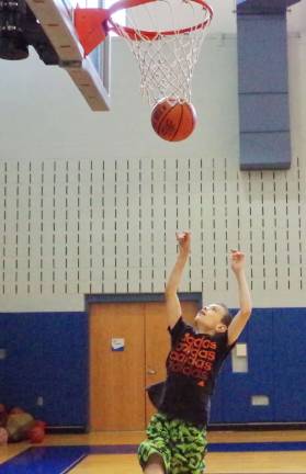 Crossroads basketball camp comes to area Matthew Herman, 12, of Stanhope, New Jersey shoots the ball.