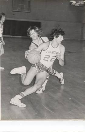 Sussex County History Today: Basketball legend Mike Ferrara has the ball as Bill Curtain, back left, watches. (Photos provided)