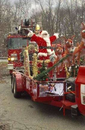 Santa Claus is shown touring with the Hardyston Township Fire Dept. in the Stockholm section of the township.