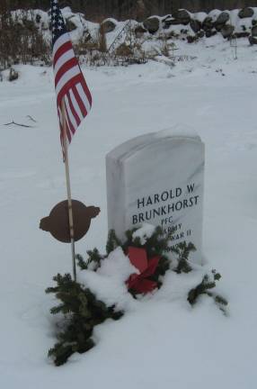 Veterans&#x2019; graves at the Northern New Jersey Memorial Cemetery were decorated for Christmas with wreaths provided by Wreaths Across America.