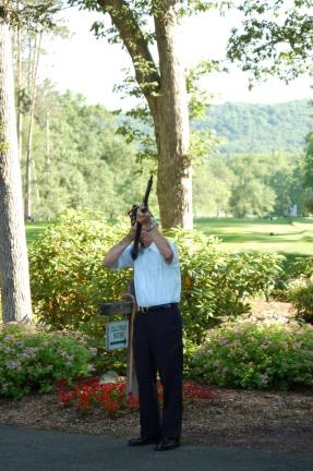 Flag raised prior to golf outing Service Officer Joe Mikowski, American Legion Post 423, fires a volley of three shots to complete the flag raising ceremony at the 40th annual Wiegand Farm Golf Outing. Captain William Carroll was honored by the Department for Persons with Disabilities, Diocese of Paterson for his service to our country. He received letters of commendation from the Most Reverend Arthur J. Serratelli, Bishop of Paterson and New Jersey Governor Chris Christie.