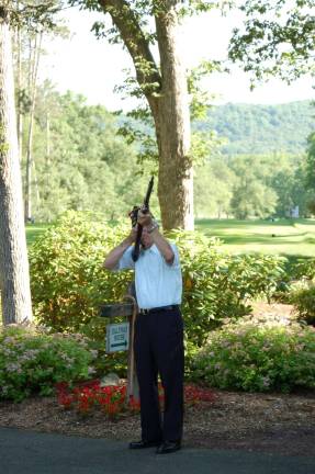 Service Officer Joe Mikowski, American Legion Post 423, fires a volley of three shots to complete the flag raising ceremony at the 40th annual Wiegand Farm Golf Outing. Captain William Carroll was honored by the Department for Persons with Disabilities, Diocese of Paterson for his service to our country. He received letters of commendation from the Most Reverend Arthur J. Serratelli, Bishop of Paterson and New Jersey Governor Chris Christie.