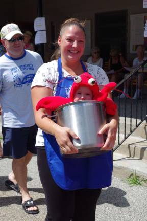 Cheryl Hastie added a bit of levity to the parade with six-month-old Clayton&#x2019;s lobster costume.