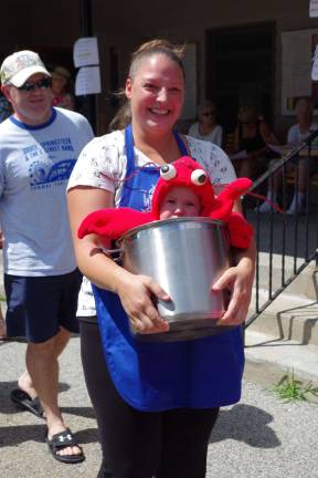 Highland Lakes families enjoy special day Cheryl Hastie added a bit of levity to the parade with six-month-old Clayton’s lobster costume.