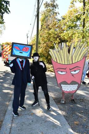 Franklin. Borough hosts Halloween parade Ash, Ali and Peter Wronka are shown.