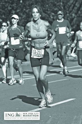 How to qualify for the Boston Marathon Laura DeLea, captain of Team Eastern in Sparta, running in the NYC Marathon.