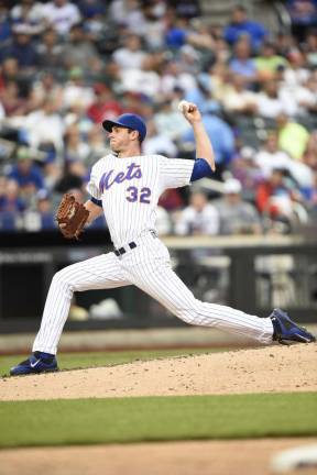 New York Mets rookie throws a pitch in his first games against the Reds on Sunday, which the Mets won 7-2. Photo provided courtesy of the New York Mets.