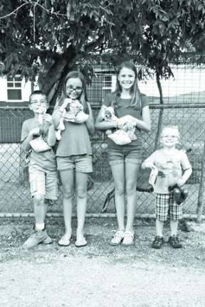 Alyssa and Aiden Shultz, Paige and Bradey Patrie of Wantage came with bears in hand to Teddy Bear Day at Space Farms.