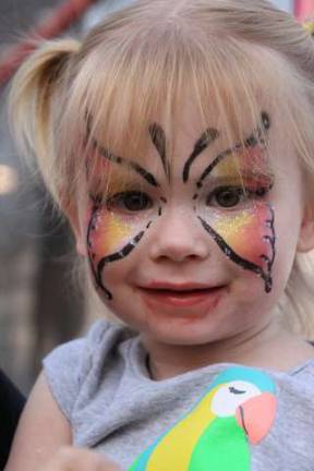 Kendall Bisson of Hopatcong had her face painted to blend in with the butterflies at the Butterfly Connection.