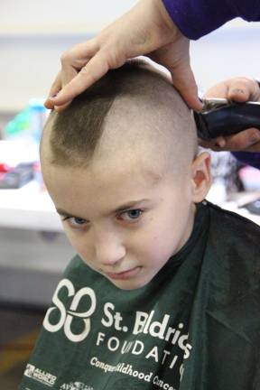Getting a mohawk is Jack Murray of Vernon at Sussex Firehouse for the St. Baldericks fundraiser.