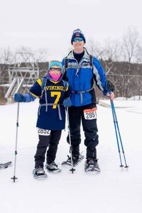 Suzanne and Sean Mayer of Lafayette take part in the Viking Snowshoe Invasion.
