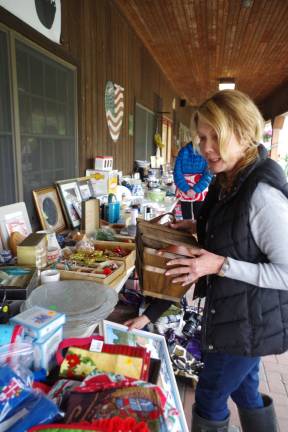 Heaven Hill Farm employee Susan Raia ended up being one of the garage sale&#xfe;&#xc4;&#xf4;s biggest supporters as she collected kitchen-related items to give to a family member who is moving into new living quarters.
