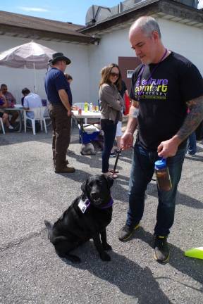 Representing Creature Comfort Pet Therapy Sean Thorne of Belvidere brought his dog Raven to Sussex Elks Lodge #2288. Raven was but one a several therapy dogs who came to the fundraiser for special children.