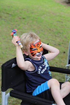 Community comes out for child battling condition Jimmy Tangney of Stockholm was very peased with his final tiger results at the Owiepalooza fundraiser.
