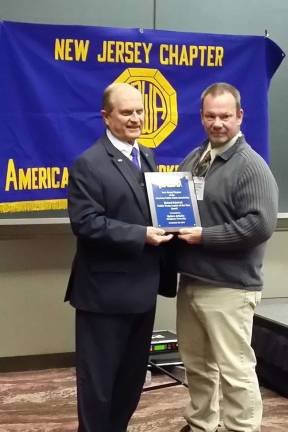 Hardyston Township Director of Public Works Robert Schultz is presentated a plaaque by the New Jersey Chapter of the American Public Works Association.