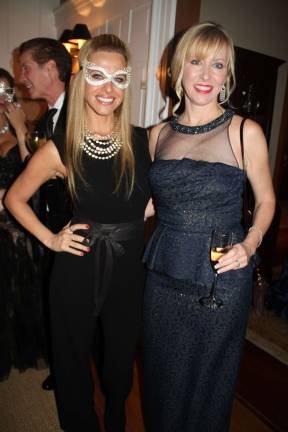 Photo by Amy Cilli Dina Manzo and Beth Tiger at the masquerade ball.