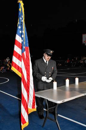 Photos: 9/11 Lights Memorial Service in Franklin Candles are lit during the annual 9/11 Lights Memorial Service on Thursday, Sept. 11 at the Franklin Pond.