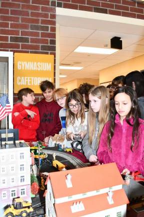 RR3 Fifth-grader Avery Willson holds the remote control.