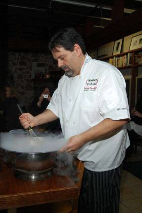 Lafayette man wins 'Best Sandwich' In the kitchen at his most recent 'pop-up dinner,' held at Salt Studio in Andover, George Mandakas makes ice cream with liquid nitrogen.