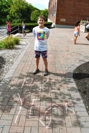 Photos: Chalk the Walk in Ogdensburg Parker Zawacki’s message to fellow students: ‘Have a good year.’