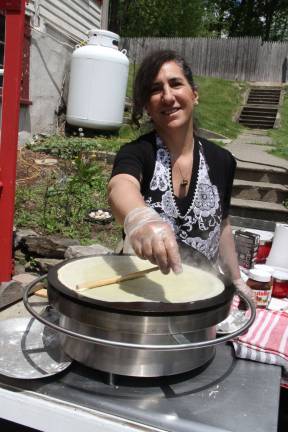 Lafayette celebrates its historic district with fair Lena Schugart of Sparta making crepes.