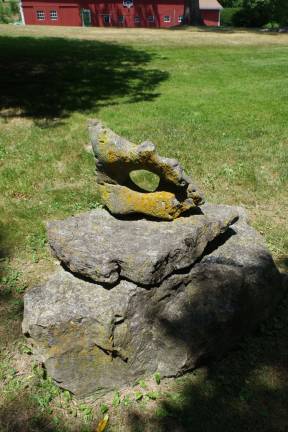 Meadowburn Farm draws photographersopens for visitors A natural stone sculpture.