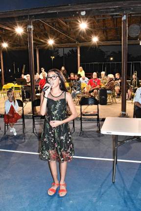 Photos: 9/11 Lights Memorial Service in Franklin Mia Sanchez sings ‘Little Did She Know (She’d Kissed a Hero).’