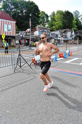 Photos: Pass it Along’s 14th annual Triathlon Shane Schwarz, 42, of Highland Lakes finishes third overall after coming in second in swimming, third in cycling and sixth in running.