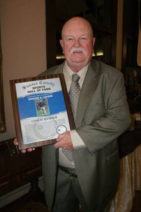 Ed Levens, Hall of Fame Class of 2015, holds his Hall of Fame plaque
