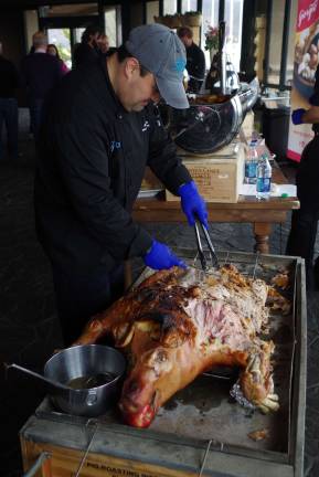 Foodies and wine connoisseurs converge in Hardyston Freshly roasted pork was just one of hundreds of different food offerings available for visitors at the Eighth Annual New Jersey Wine & Food Festival at Crystal Springs Resort.