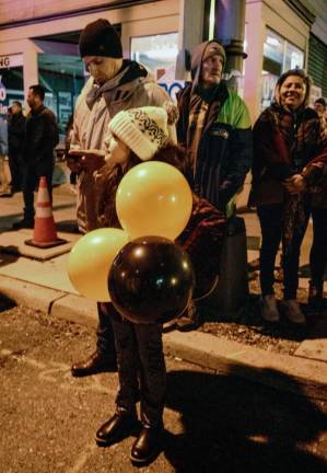 Many Hackettstown businesses stayed open New Year’s Eve. There were giveaways of balloons, hats and noisemakers.