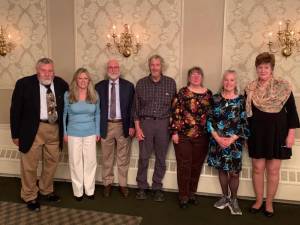 Kevin Karlson, center, the guest speaker at the Sussex County Bird Club’s 70th anniversary dinner, poses with, from left, club committee members Jack Padalino, Lori Krieger, Bill McDaniel, Karen Cichocki, Kathy Wilson and Sandy McPhail. (Photo provided)