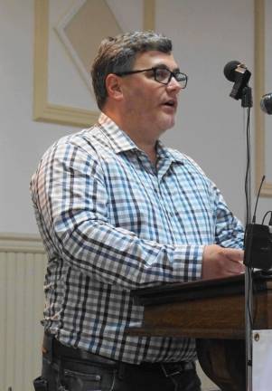 Ogdensburg hosts candidates night Councilman Michael Nardini reads a statement on behalf of Mayor Rachel Slater.
