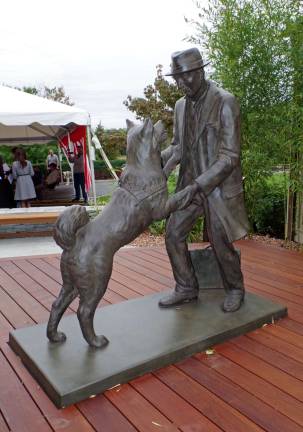 Bond between a man and his dog is a legend On Sunday, Derek Cooke, a co-owner of Abbey Glen Pet Memorial Park unveiled a reproduction of a statue of depicting the bond between a Japanese professor and his dedicated Akita companion.