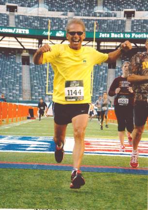 Photo provided Joe Farinella of Andover pictured running in one of the New York Road Runners Club orchestrated races at Meadowlands Stadium.