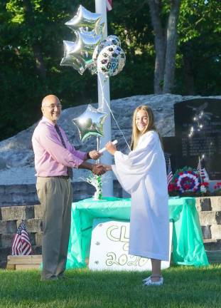 Superintendent David Astor congratulates Valedictorian Ashley Sutherland. (Photo by Vera Olinski)