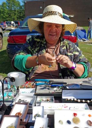 Aggie Keith of Matawan spent Saturday afternoon creating jewelry using sterling silver to wire-wrap polished stones at the Franklin-Sterling Gem &amp; Mineral Show. Her company is called, &#xfe;&#xc4;&#xfa;&#xfe;&#xc4;&#xf2;ROCK&#xfe;&#xc4;&#xf4; ON!!&#xfe;&#xc4;&#xf9; It is the show&#xfe;&#xc4;&#xf4;s 60th year and its second show of 2016.